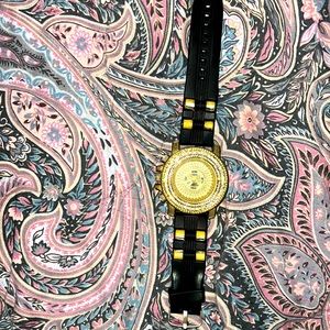 It’s a gold watch with diamond on it